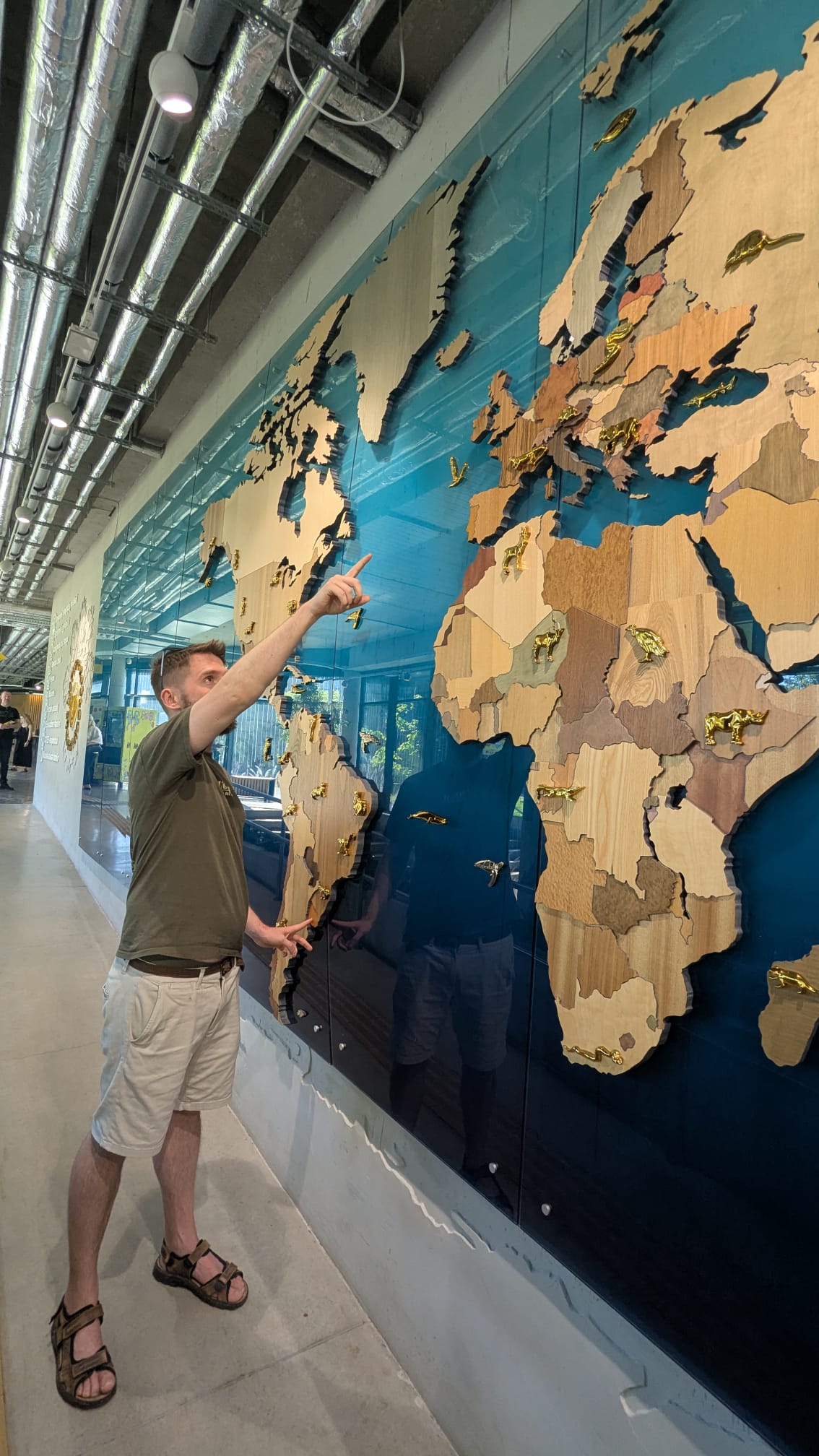 Pointing across the world map, from South America to the Baltics